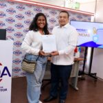 Evelin Maciel Liriano y el directro jose ruben